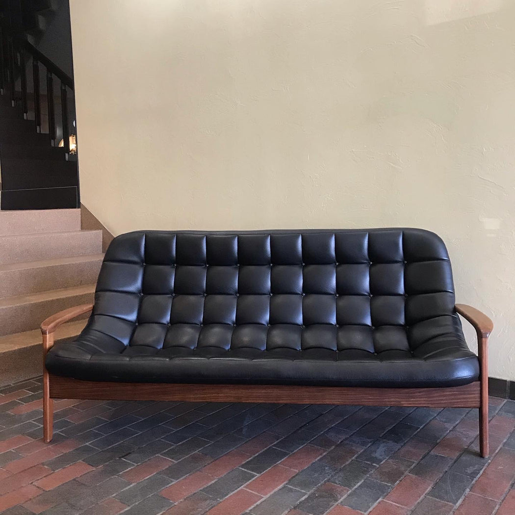 SOLD • Black R. Huber Scoop Sofa