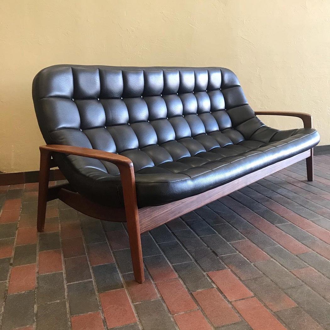 SOLD • Black R. Huber Scoop Sofa
