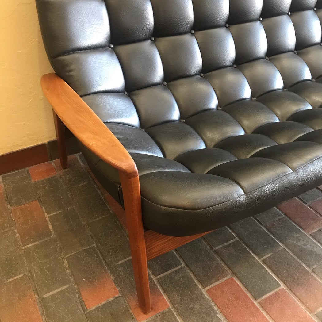 SOLD • Black R. Huber Scoop Sofa